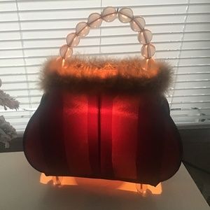 Cute purse shaped light with genuine feathers
